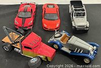 Front view of all five die-cast vehicles