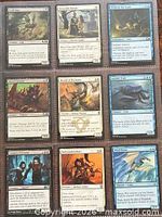 Front view of all nine cards laid out 3×3 showing artwork and names
