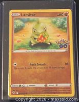 Front of Larvitar card showing artwork, card details, sleeve