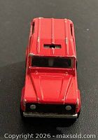 Front view showing grille, hood shape and overall condition