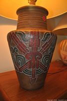Close-up of ceramic lamp body showing Art Deco Southwestern pattern