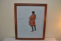 Full view of framed winter hunting scene painting