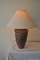 Full view of ceramic table lamp with shade