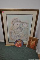 Framed lithograph, decorative plate, book grouped together