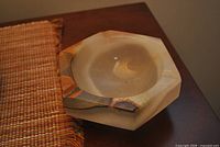 octagonal cream onyx/marble ashtray on table