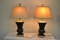 Front view of both matching lamps illuminated
