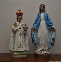 Front view of both statues side by side