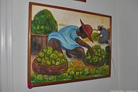 Full view of signed oil painting in wood frame showing figures harvesting fruit