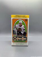 Front view of sealed blaster box showing Sidney Crosby image and product details