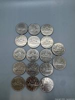 Front view of all 17 Canadian dollar coins