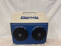 Front view showing Playmate logo and two speaker grilles