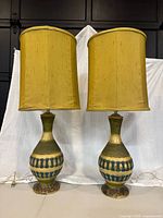 Both lamps with shades attached