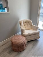 rocker chair next to pink pouf