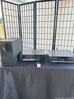 Full view of Bose subwoofer, Pioneer receiver, Sony CD changer