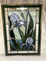 Full view of stained glass panel showing design and frame