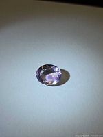 Front view of the oval amethyst under light