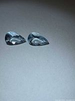 Pair of pear-cut aquamarines side by side