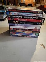 Stack of DVD cases showing titles on spines