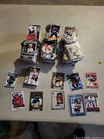 Stacks of hockey trading cards plus sleeved highlights displayed