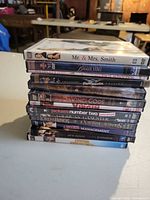 Stack of DVDs showing spine titles, Mr. & Mrs. Smith on top