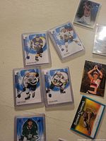 Sleeved hockey and Goodwin Champions cards