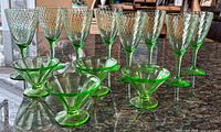 Complete set of eight goblets and four sherbet dishes displayed on counter