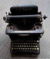 Top view showing L.C. Smith branding, keyboard layout and ribbon spools