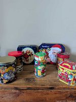 Group shot of all eight tins on tabletop