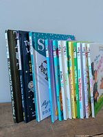 Row of 12 Dr. Seuss Beginner Books, showing spines and front covers