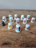 Group shot of all 13 thimbles showing variety