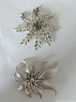 Both brooches front view