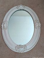 Full front view of oval mirror