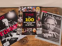 All three magazines arranged on table