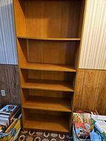 Front view of bookcase showing five shelves