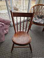 Front view of wooden spindle back chair