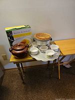 Full lot showing boxed chip & dip set, bean pot, six bowls on tray, bun warmer stack, wicker basket