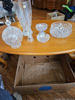 Group view of all six crystal pieces on table