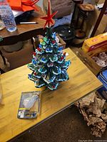 ceramic tree with bulb on tabletop