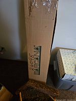 Tall Barcana cardboard box for artificial tree