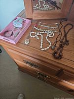 Overall view of jewelry pieces on dresser