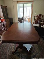 Top view of dining table with surrounding chairs visible