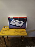 Boxed view of electric double burner stove