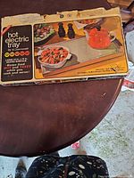 Cromwell hot electric tray box front showing size and graphics