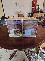 Front view of two Frame Up connector kit boxes