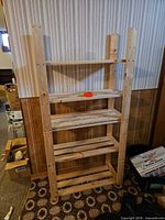 Front view of full 5-shelf wooden rack