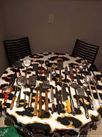 Full table view of all utensils and knives