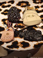 Overview of all four bags on table