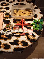 Overview of lot: track bin, bridge, trees, accessories