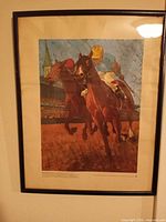 Full frontal view of framed print on wall