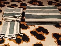 Stacked striped terry towel and washcloths